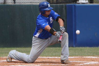 Hayden Lessenberry tries to get a sacrifice bunt down. (Photo by Rick Nation)