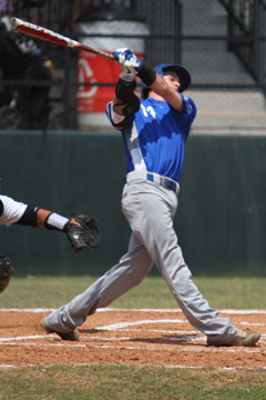 Jordan Taylor takes a cut. (Photo by Rick Nation)