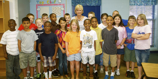 Kathy Daniel and her third-grade class at Davis Elementary. (Photo by Michael Kornegay)