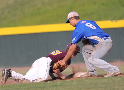 Josh Pultro (8) applies a tag on a pickoff play against John Michael Lipton. (Photo by Kevin Nagle)