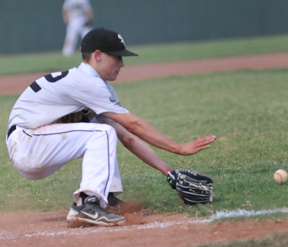 Third baseman Harrison Dale, reaches for a slow roller. (Photo by Kevin Nagle)