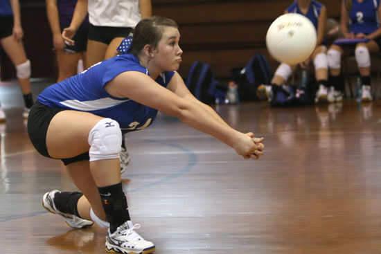 Brooke Howell digs up a hit during Thursday's jamboree. (Photo by Rick Nation)