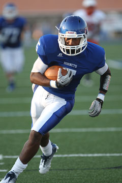 K.J. Hill heads to the end zone on a pass during the Bryant Hornets' preseason scrimmage against Little Rock Hall on Aug. 23. (Photo by Rick Nation)