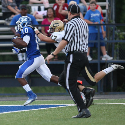 Davonte Howard (10) reaches the end zone ahead of a Little Rock Central defender in last Friday's first half. (Photo by Rick Nation)