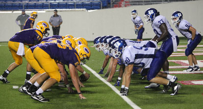 The Bryant defense sets up to keep Catholic out of the end zone. (Photo by Rick Nation)