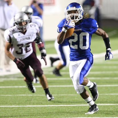 Jalen Bell (20) sprints on the way to the end zone past Benton's Ryan Rodriguez. (PHoto by Rick Nation)