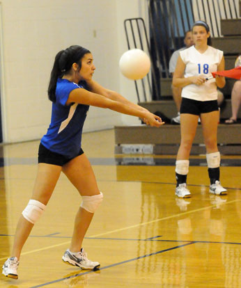 Rochelle Aguilar receives a serve. (Photo by Kevin Nagle)