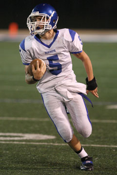 Gunnar Burks rushed for 100 yards. (Photo by Rick Nation)