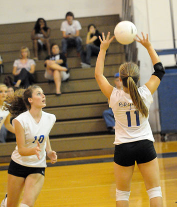 Hannah Rice (11) sets for Alyssa Anderson (10)