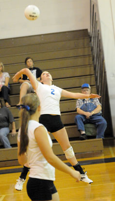 Emily Henson (2) prepares to take a swat at the ball. (Photo by Kevin Nagle)