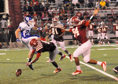 Devarious Rice blocks Bryce Denker's punt. (Photo by Kevin Nagle)