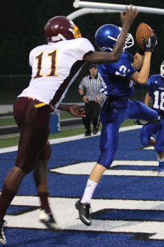 Bryant's Evan Lee (12) steps in front of Lake Hamilton's Jason Burks for an interception on a two-point conversion. (Photo by Rick Nation)