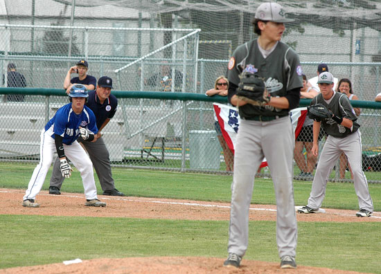 Garrett Misenheimer, left, leads off first after cracking the first hit of the game for Bryant's All-Stars leading off the fifth inning. (Photo courtesy of Steven Smith/Hometown Sports)