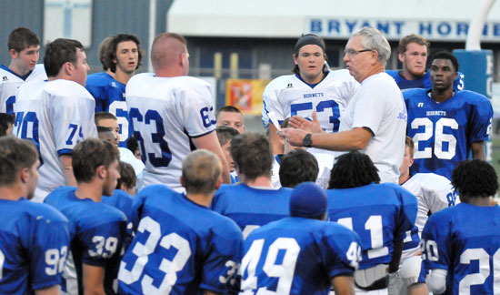 Volunteer coach Bobby Joe Gentry addresses the sophomores after their scrimmage Friday night. (Photo by Kevin Nagle)