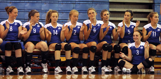 The Lady Hornets' bench cheers on their teammates. (Photo by Rick Nation)