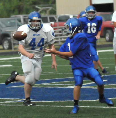 Bryant Blue receiver Tyler O'Neal (3) looks in a pass as Bryant White's Travis Bradberry bears down on him. (Photo by Kevin Nagle)