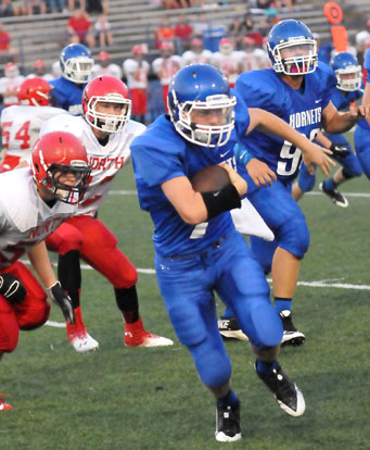 Bryant quarterback Beaux Bonvillain scrambles. (Photo by Kevin Nagle)