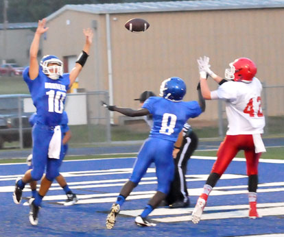 Bryant's Austin Kelly (10) and Caylin Allen (8) try to get to the pass that found Jack Teague (42) for Cabot North's two-point conversion. (Photo by Kevin Nagle)