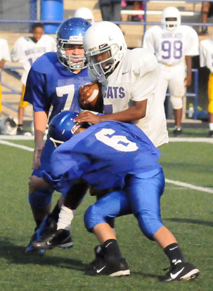 Riley Morales (6) makes a tackle. (Photo by Kevin Nagle)