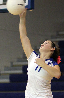 Abby Staton serves for the Lady Hornets. (Photo by Rick Nation)