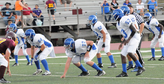 Neal Brenton (10), Brandon Hopkins (54), Bryce Thomas (72), Nick Smith (52), A.J. Todd (53), Brooks Ellis (33) and James Polite (8) line up on defense. (Photo by Kevin Nagle)