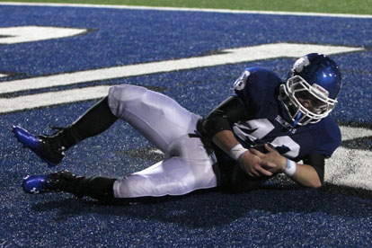 Collin Chapdelaine falls on the fumble in the end zone forced by Mark Nelson's hit, resulting in a Bryant touchdown. (Photo by Rick Nation)