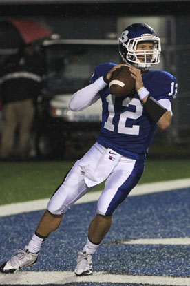 Brandan Warner looks to throw out of his own end zone. (Photo by Rick Nation)