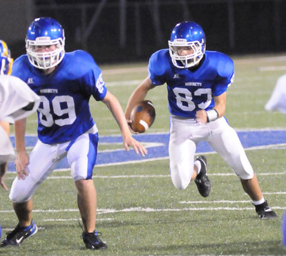 Jordan Gentry (83) looks to take advantage of a block from Jake Hall (89). (Photo by Kevin Nagle)