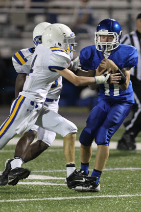 Jake East (11) secures a pass that set up one of Chase Kincaid's two field goals. (Photo by Rick Nation)