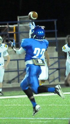 Phillip Isom-Green looks the ball in on an interception. (Photo by Kevin Nagle)