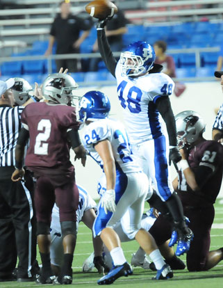 Bryant linebacker Connor Chapdelaine celebrates his fumble recovery. (Photo by Kevin Nagle)