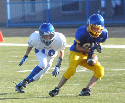 Bryant White's Neal Brenton (10) breaks toward a Lakeside receiver. He would later intercept a pass and return it for a touchdown. (Photo by Kevin Nagle)