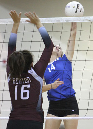 Sophomore Sierra Jones (14) goes up for a hit. (Photo by Rick Nation)