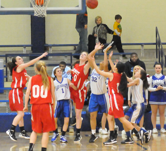 Bryant's Kennedy Harris battles for a rebound. (Photo by Kevin Nagle)