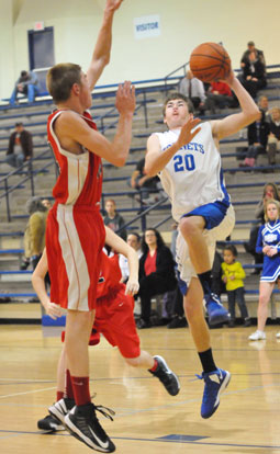 Bryant's Evan Lee goes to the hole. (Photo by Kevin Nagle)