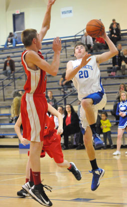 Bryant's Evan Lee goes to the hole. (Photo by Kevin Nagle)