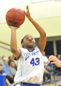 Deja Rayford puts up a shot. (Photo by Kevin Nagle)