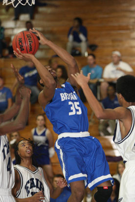 Brian Reed goes up for a shot in front of J.A. Fair's Allante Plant. (Photo by Rick Nation)