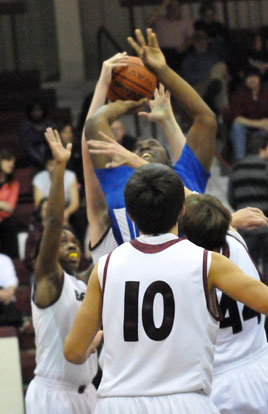 Bryant's Cameron Murray is attacked as he tries to got a shot away inside. (Photo by Kevin Nagle)