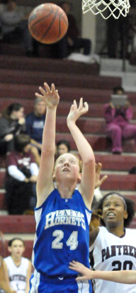 Britney Sahlmann (24) led the Lady Hornets with 8 points and 10 rebounds. (Photo by Kevin Nagle)