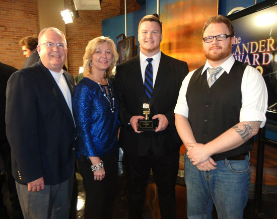 Ian Shuttleworth with his parents Ken and Janet and older brother Aaron.