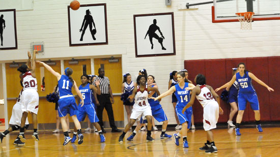 Bryant's starters Logan Davis (11), Dezerea Duckworth (5), Courtney Davidson, Peyton Weaver (14) and Whitney Meyer (50) defend the Texarkana Lady Razorbacks including Shaqueda Cooper (20), Stacy Manley (44) and Jasmine Allen (12). (Photo by Kevin Nagle)