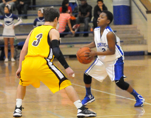 Bryant's Alex Oneal tries to work around Lake Hamilton's Dallas Baldwin. (Photo by Kevin Nagle)