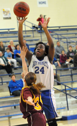 Penny Smith (24) goes up for a shot inside. (Photo by Kevin Nagle)