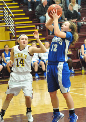 Skylar Davis pulls up for a shot in the lane. (Photo by Kevin Nagle)