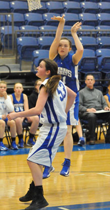 Annie Patton follows through on a jump shot. (Photo by Kevin Nagle)