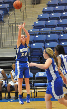 Britney Sahlmann launches a jumper from the wing. (Photo by Kevin Nagle)