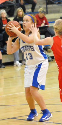 Kara Moser sets to fire up a shot. (Photo by Kevin Nagle)