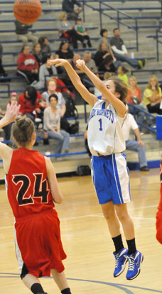 Abby Ostrem takes a shot. (Photo by Kevin Nagle)