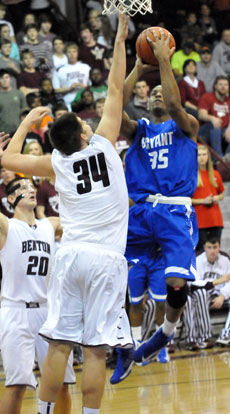 Brian Reed (35) tries to get a shot over Graham Gardner. (Photo by Kevin Nagle)